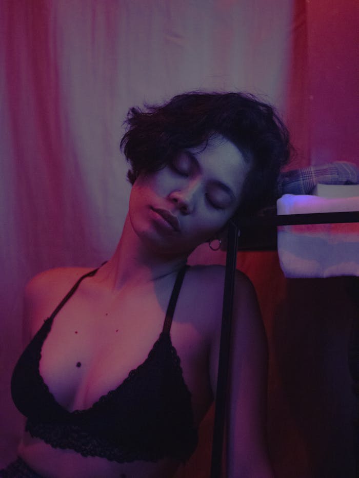 gallery-4 Captivating photo of a woman in soft studio lighting, showcasing serene beauty and elegance.